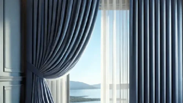 Deep-blue-motorized-curtain-tied-back-with-sheer-white-curtains-and-a-view-of-a-lake-and-mountains