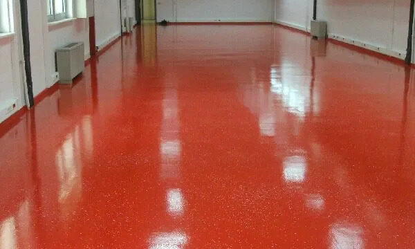 empty-room-with-a-high-gloss-bright-red-epoxy-floor-reflecting.webp.bv_resized_ipad.webp.bv_